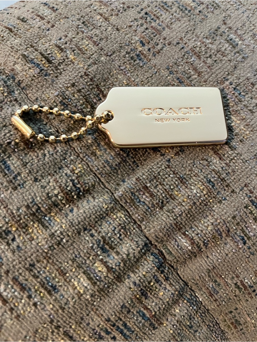 Coach Shiny Gold Engraved Purse Charm